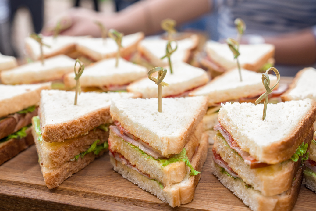 Kosher catering background. Food catering. Slider bar background. Vegan sliders, ham and vegetable slider bar. Buffet food for party catering. Cuisine Culinary Gourmet Buffet. Sandwich tray